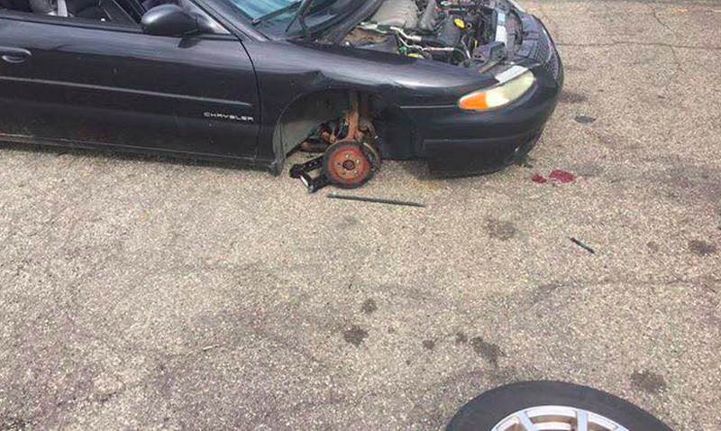 The car that nearly killed Kyle. You can see blood in front of the front bumper.